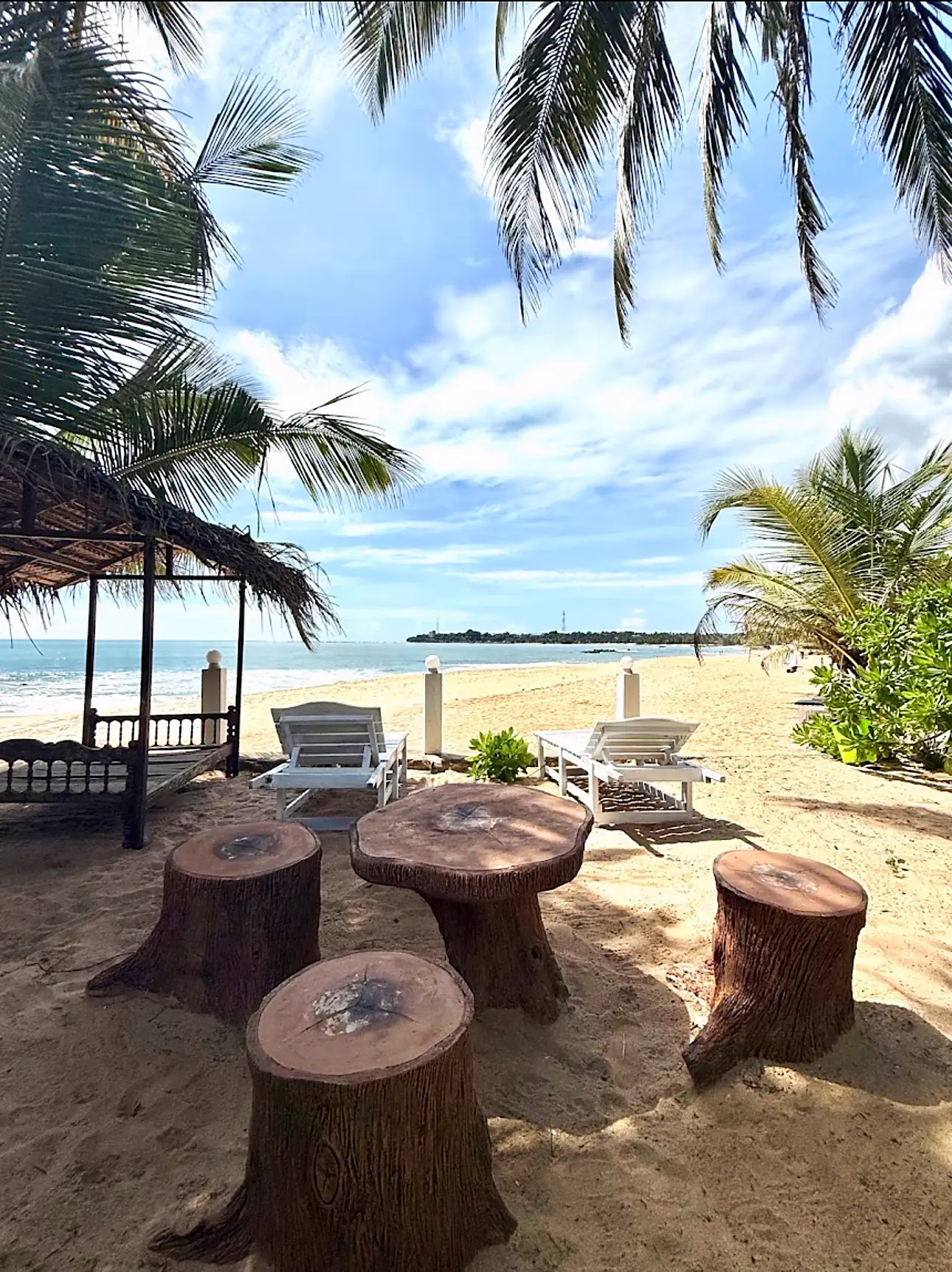 Loungers and shade on the beach at Tangalle, Sri Lanka, near CanRoyal Resort
