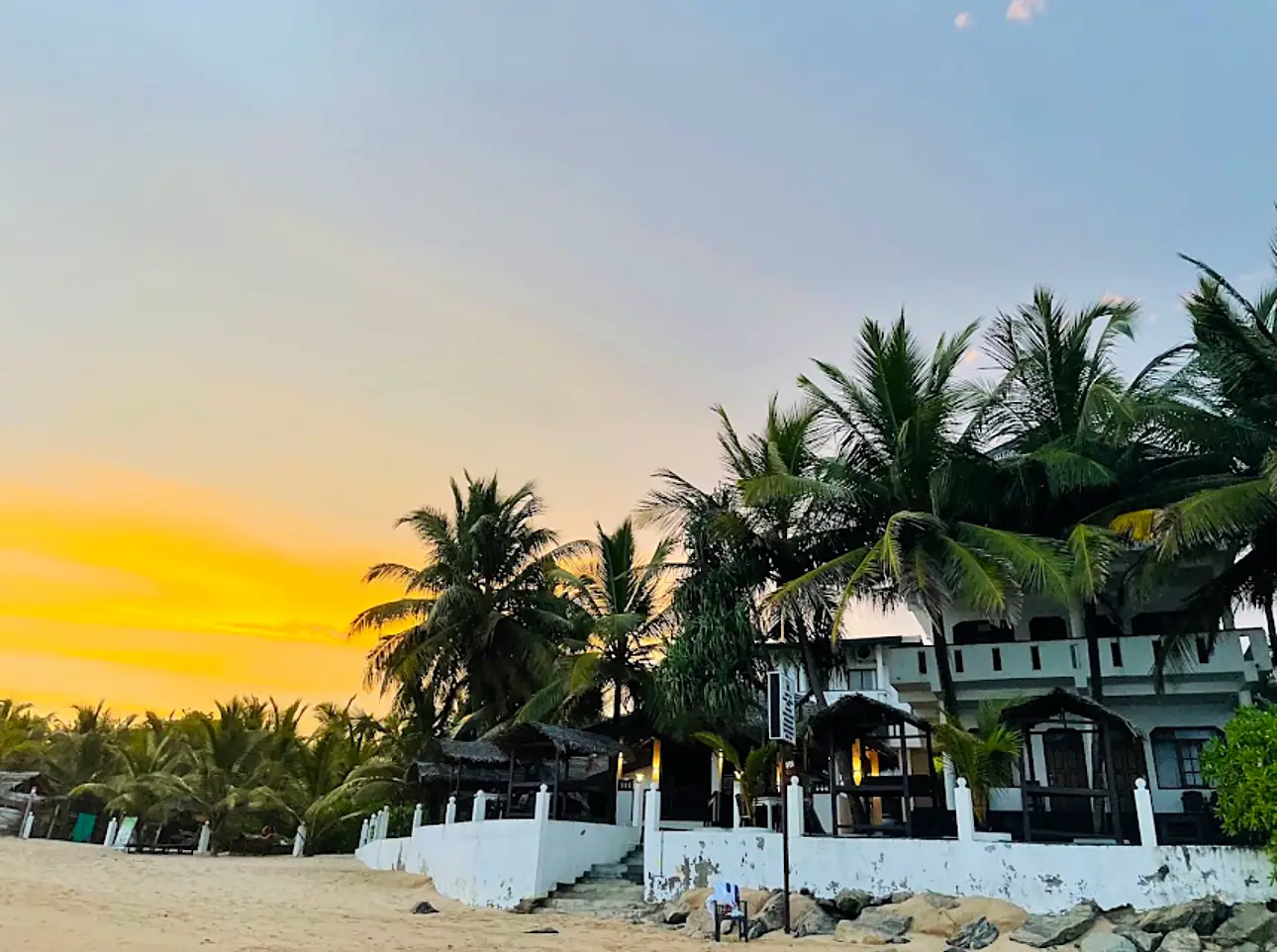 Palms and evening light over the coastline at Tangalle, Sri Lanka, near CanRoyal Resort